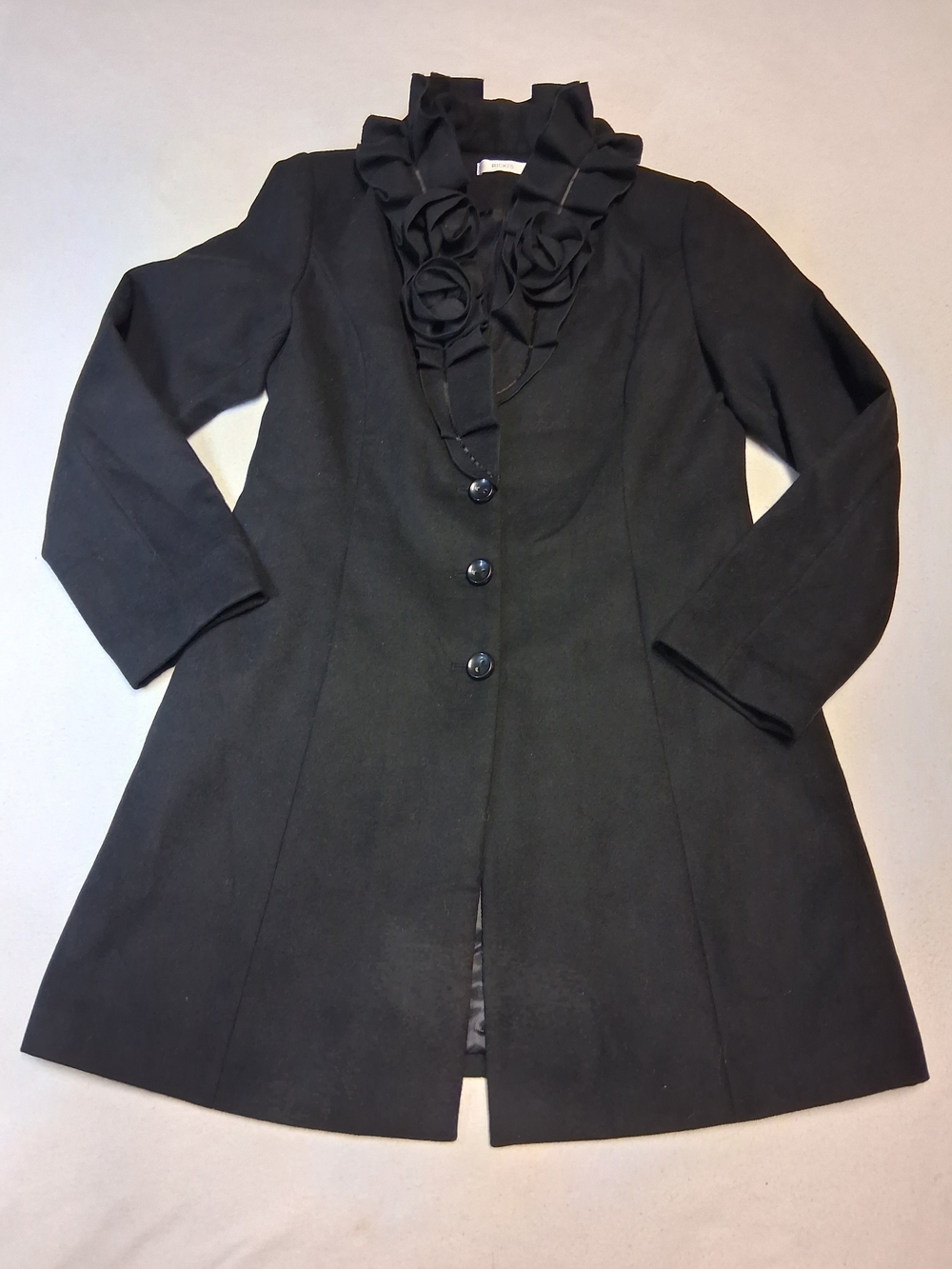 Ricki's Black Ruffle Collar Trench Coat with Rosette Detail